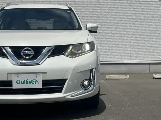 日産 エクストレイル ハイブリッド モード・プレミア 秋田県 2016(平28)年 9.7万km ブリリアントホワイトパール ４WD/衝突軽減システム/LEDヘッドライト/社外アルミ/スマートキー/アイドリングストップ/プッシュスタート/コーナーセンサー/ダウンヒルアシストコントロール/ステアリングスイッチ/前席シートヒーター/純正エンジンスターター/ETC/ルーフレール/純正フロアマット/純正ドアバイザー/オートライト/オートエアコン/パワーステアリング/パワーウィンドウ/横滑り防止/電動格納ウィンカーミラー/保証書/取扱説明書/記録簿