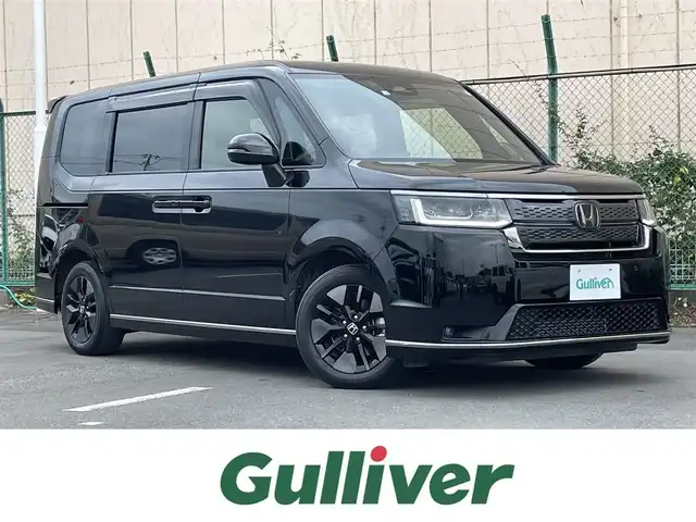 ホンダ ステップワゴン スパーダ 東京都 2022(令4)年 2.8万km クリスタルブラックパール １１．４型ホンダコネクトナビ＆フルセグ　/・AppleCarPlay＆AndroidAuto/・BluetoothAudio/・CD/SD/DVD/AM/FM/両側パワースライドドア　/パワーバックドア　/ブラインドスポットモニター　/ホンダセンシング/（安全運転支援システム）/・衝突軽減ブレーキ/・後方誤発進抑制機能/・歩行者事故低減ステアリング/・渋滞追従機能付クルーズコントロール/・車線維持支援システム/・先行者発進お知らせ機能/・誤発進抑制/・近距離衝突軽減ブレーキ/・標識認識機能/撥水ファブリックコンビシート /・前席シートヒーター/・キャプテンシート /ＬＥＤヘッドライト /シートバックテーブル/ビルトインETC/プッシュエンジンスタート/スマートキー