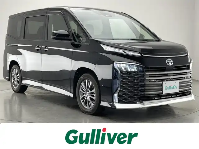 トヨタ ヴォクシー ハイブリッド S－G 愛知県 2022(令4)年 4万km アティチュードブラックマイカ 純正１０．５型ディスプレイナビ　全方位カメラ　禁煙車　純正１４型後席モニター　トヨタチームメイト　アドバンスドパーク　ＤＶＤデッキ　フルセグＴＶ　ＢＳＭ　ＨＤＭＩ　衝突軽減　車線逸脱　追従クルコン　ＡＣ１００Ｖ　セーフティセンス　コーナーセンサー　LEDオートライト　オートハイビーム　純正アルミホイール