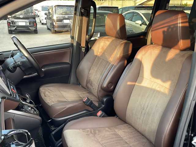 トヨタ エスクァイア ハイブリッド Gi プレミアムパッケージ 山口県 2020(令2)年 7.5万km ブラック Toyota Safety Sense C/(衝突回避支援/レーンディパーチャーアラート/オートマチックハイビーム)/フロントエアロ（TRD　SPORTIRO）/社外１１インチメモリナビ(アルパイン　EX11Z-EQ)/（AM/FM/CD/DVD/BT/フルセグ）/バックカメラ/両側電動スライドドア/クルーズコントロール/LEDオートライト/ハーフレザーシート/シートヒーター/１７インチアルミホイール/ドライブレコーダー　（AG421-DRC）/スマートキー/ビルトインETC