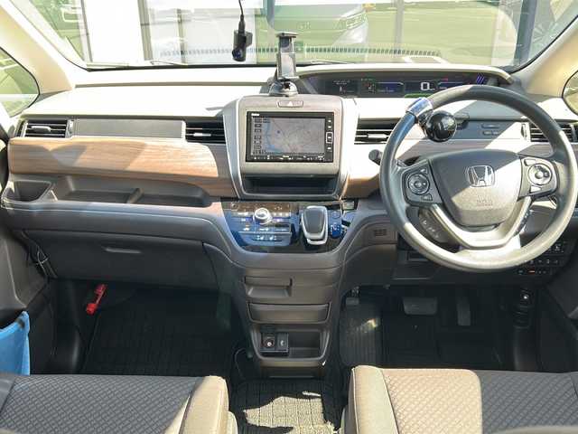 ホンダ フリード ハイブリット G ホンダセンシング 岐阜県 2019(令1)年 2.7万km シーグラスブルーパール 登録時走行距離26919km/純正ナビ/フルセグＴＶ/バックモニター/両側パワースライドドア/ラジアルタイヤ（４本)/クルーズコントロール/レーンキープアシスト/シートヒーター/純正フロアマット/前後ドライブレコーダー/禁煙車/プッシュスタート/スマートキー/後席サンシェード/衝突被害軽減システム/LEDヘッドライト/オートライト/社外15インチアルミホイール/CDチェンジャー/Bluetooth接続/USB入力端子/ETC