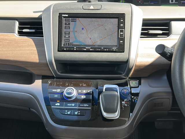 ホンダ フリード ハイブリット G ホンダセンシング 岐阜県 2019(令1)年 2.7万km シーグラスブルーパール 登録時走行距離26919km/純正ナビ/フルセグＴＶ/バックモニター/両側パワースライドドア/ラジアルタイヤ（４本)/クルーズコントロール/レーンキープアシスト/シートヒーター/純正フロアマット/前後ドライブレコーダー/禁煙車/プッシュスタート/スマートキー/後席サンシェード/衝突被害軽減システム/LEDヘッドライト/オートライト/社外15インチアルミホイール/CDチェンジャー/Bluetooth接続/USB入力端子/ETC