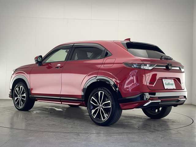 ホンダ ヴェゼル ハイブリッド e:HEV Z 宮崎県 2021(令3)年 2万km プレミアムクリスタルレッドM 禁煙車/ホンダセンシング/純正9型ディスプレイオーディオナビTV/（HONDA CONNECT/USB/HDMI/Bluetooth/フルセグTV)/純正ビルトイン2.0ETC/純正ドライブレコーダー/純正LEDオートライト/純正LEDフォグ/純正18インチアルミ/純正フロアマット/アダプティブクルーズコントロール/レーンディパーチャーアラート/ブラインドスポットモニター/ダウンヒルアシストコントロール/クリアランスソナー/ウインカードアミラー/パドルシフト/置くだけ充電/ステアリングヒーター/前席シートヒーター/デュアルオートエアコン/スマートキー/プッシュエンジンスタート/スペアキー