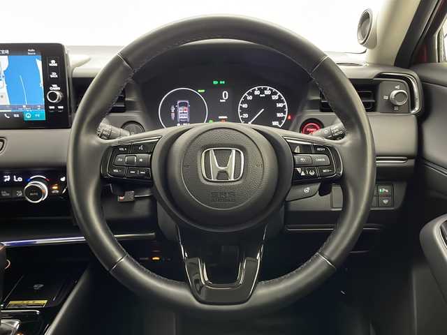 ホンダ ヴェゼル ハイブリッド e:HEV Z 宮崎県 2021(令3)年 2万km プレミアムクリスタルレッドM 禁煙車/ホンダセンシング/純正9型ディスプレイオーディオナビTV/（HONDA CONNECT/USB/HDMI/Bluetooth/フルセグTV)/純正ビルトイン2.0ETC/純正ドライブレコーダー/純正LEDオートライト/純正LEDフォグ/純正18インチアルミ/純正フロアマット/アダプティブクルーズコントロール/レーンディパーチャーアラート/ブラインドスポットモニター/ダウンヒルアシストコントロール/クリアランスソナー/ウインカードアミラー/パドルシフト/置くだけ充電/ステアリングヒーター/前席シートヒーター/デュアルオートエアコン/スマートキー/プッシュエンジンスタート/スペアキー