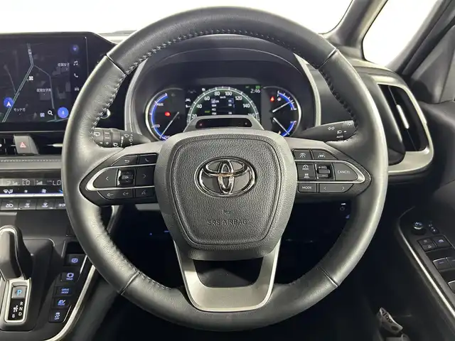 トヨタ ヴォクシー ハイブリッド S－Z 佐賀県 2024(令6)年 1.9万km アティチュードブラックマイカ 純正10.5インチディスプレイオーディオ/＜フルセグTV/ナビキット/DVDキット＞/アドバンスドパーク/エレキトロニックシフト/ミラー型ドライブレコーダー/モデリスタエアロ＜F/R/S＞/モデリスタクールシャインキット/シグネチャーイルミグリル/イルミルーフスポイラー/革調シートカバー/シートヒーター/TVキャンセラー/Toyota Safety Sense/・LDA/・BSM/・PCS/・PDA/・PKSB/・RCD/・RSA/・アドバンスドドライブ/・LCA/・レーダークルーズコントロール