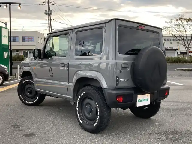 スズキ ジムニー XL 鳥取県 2022(令4)年 1.4万km ミディアムグレー ４・W・D・ターボ/ワンオーナー/社外DPオーディオ/DVD/CD/BT/USB/API0コンプリートカーTSシリーズ/API0フロントバンパー/API0フロントグリル/API016インチアルミ/API0背面タイヤカバー/TOYOオープンカントリータイヤ/レーダーブレーキサポート/前後ドライブレコーダー/前席シートヒーター/LEDヘットライト/オートハイビーム/プッシュエンジンスタート/アイドリングストップ/スペアキー