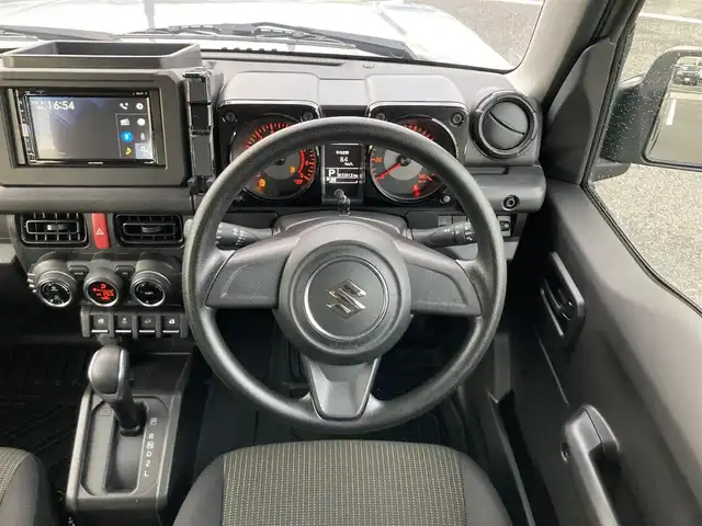 スズキ ジムニー XL 鳥取県 2022(令4)年 1.4万km ミディアムグレー ４・W・D・ターボ/ワンオーナー/社外DPオーディオ/DVD/CD/BT/USB/API0コンプリートカーTSシリーズ/API0フロントバンパー/API0フロントグリル/API016インチアルミ/API0背面タイヤカバー/TOYOオープンカントリータイヤ/レーダーブレーキサポート/前後ドライブレコーダー/前席シートヒーター/LEDヘットライト/オートハイビーム/プッシュエンジンスタート/アイドリングストップ/スペアキー