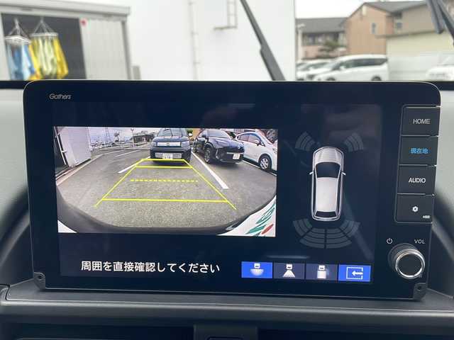 ホンダ フリード ハイブリット e:HEV クロスター 三重県 2025(令7)年 0.1千km メテオロイドグレーメタリック 純正９インチコネクトナビ/アップルカープレイ/ＢＳＭ/両側パワースライドドア/バックカメラ/前席シートヒーター/追従クルーズコントロール/コーナーセンサー/ＵＳＢ給電/ＬＥD/ハーフレザーシート/ステアリングリモコン/禁煙車