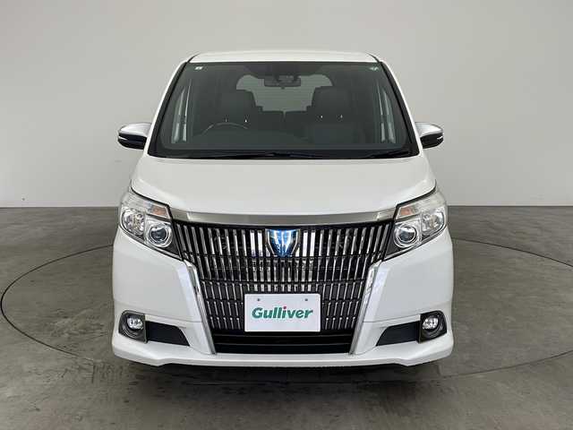 トヨタ エスクァイア ハイブリッド Gi プレミアムパッケージ ブラックテーラード 兵庫県 2017(平29)年 6万km ホワイトパールクリスタルシャイン ・ワンオーナー/・純正ナビ/CD/DVD/BT/USB/SD/TV/・バックカメラ/・トヨタセーフティセンス/・プリクラッシュセーフティ/・レーンディパーチャーアラート/・先行車発進告知/・オートマチックハイビーム/・クルーズコントロール/・トラクションコントロール/・両側パワースライドドア/・前席シートヒーター/・レザーシート/・WAC/・ステアリングリモコン/・LEDヘッドライト/・オートライト/・フォグランプ/・ウォークスルー/・サンシェード/・純正フロアマット/・オールオートパワーウィンドウ/・電動格納ミラー/・スマートキー/・スペアキー/・プッシュスタート