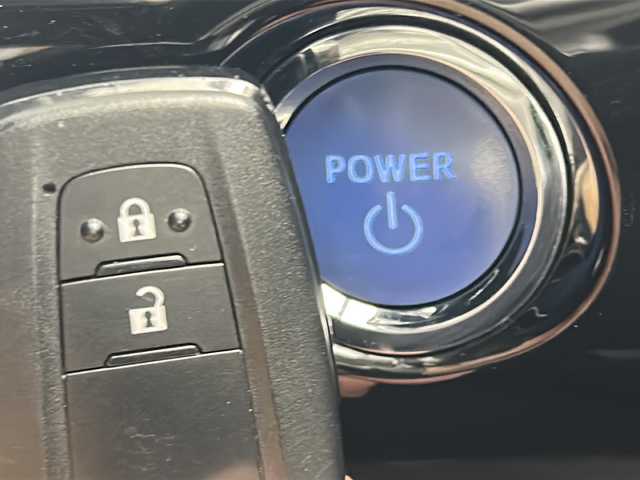 トヨタ プリウス A 三重県 2017(平29)年 5.2万km スティールブロンドM 純正7インチナビ/　フルセグTV/CD/Bluetooth/バックカメラ/衝突軽減ブレーキシステム/レーダークルーズコントロール/HUD/BSM/オートマチックハイビーム/ステアリングスイッチ/前後コーナーセンサー/レーンキープアシストシステム/パーキングアシスト/電格ウインカーミラー