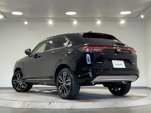 ホンダ ヴェゼル ハイブリッド e:HEV Z 愛知県 2025(令7)年 0.1千km クリスタルブラックパール 登録済未使用車　/純正９インチナビ　/（FM/AM/Bluetooth/USB/CarPlay/フルセグTV)/ホンダセンシング　/　　-衝突軽減ブレーキ/　　-誤発進抑制機能/　　-路線逸脱抑制機能/　　-アダプティブクルーズコントロール/　　-車線維持支援システム/　　-先行車発進お知らせ機能/　　-標識認識機能/　　-オートハイビーム/ワイヤレス充電　/シートヒーター　/ビルトインＥＴＣ２．０　/電動バックドア　/ステアリングヒーター　/ブラインドスポットモニター　/バックカメラ　/パドルシフト　/ソナー/プッシュスタート/　　-スマートキー
