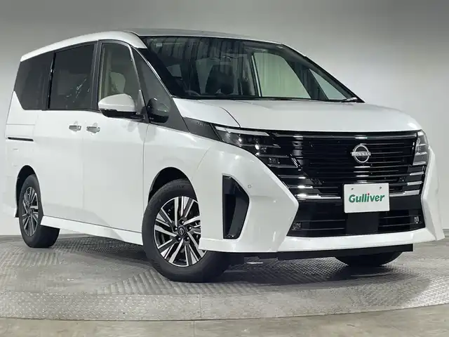 日産 セレナ e－パワー ハイウェイスター V 神奈川県 2025(令7)年 0.1千km ホワイト 登録済未使用車/統合型12.3インチインターフェースディスプレイ/アドバンスドドライブアシストディスプレイ/NissanConnectメモリーナビゲーションシステム/フルセグ HDMI 　/インテリジェントアラウンドビューモニター/両側電動スライドドア【サンシェード】/360度セーフティアシスト/インテリジェントエマージェンシーブレーキ/前方衝突予報警報/衝突回避ステアリングアシスト/車線逸脱防止支援システム/車線逸脱警報/後側方衝突防止支援システム/後側方車両検知警報/後退時車両検知警報/ふらつき警報/踏み間違い衝突防止アシスト/標識認識機能/前後ソナー/ナビリンク機能付プロパイロット緊急停止支援システム/インテリジェントルームミラー/SOSコール/ワイヤレス充電器/車載通信ユニット/ビルトインETC2.0ユニット/純正前後ドライブレコーダー/革巻きステアリング/2列目3列目パーソナルテーブル/USB電源Cソケット/アダプティブLEDヘッドライトシステム/オートライト/LEDフロントフォグランプ/純正16インチアルミホイール
