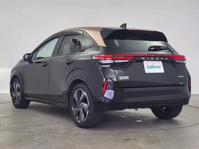日産 オーラ G レザーエディション 愛知県 2024(令6)年 2.1万km ミッドナイトブラック/サンライズカッパー プロパイロット/純正9インチディスプレイオーディオナビ/BOSEプレミアムサウンド/衝突被害軽減ブレーキ/三眼LEDヘッドライト/全方位カメラ/フルセグTV/Bluetooth/バックカメラ/コーナーセンサー/オートマチックハイビーム/純正アルミホイール/ETC2.0/スマートルームミラー/置くだけ充電器/ステアリングスイッチ/スマートキー/プッシュスタート