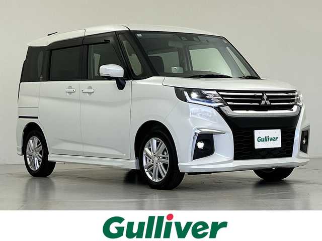 三菱 デリカＤ：２ ハイブリッドMZ 全方位カメラ付ナビPKG 愛知県 2024(令6)年 0.2万km ピュアホワイトP ワンオーナー/両側パワースライド/純正メモリナビ/フルセグTV/CD/USB/Bluetooth/全方位カメラ/バックカメラ/衝突軽減ブレーキ/レーダークルーズコントロール/HUD/LEDヘッドライト/ビルトインETC/前後ドライブレコーダー/純正15インチアルミホイール/アイドリングストップ/プッシュスタート/取扱説明書