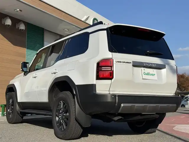 トヨタ ランドクルーザー ２５０ VX 香川県 2025(令7)年 0.5万km プラチナホワイトパールマイカ ワンオーナー/ディスプレイオーディオPLUS/JBLサウンド/サンルーフ/黒革シート/パワーシート/シートヒーター/シートベンチレーション/丸目LEDヘッドライト/デジタルインナーミラー/パワーバックドア/12.3インチTFTメーター/ルーフレール/置くだけ充電/クリアランスソナー/純正ヘッドライト積込/ビルトインETC2.0
