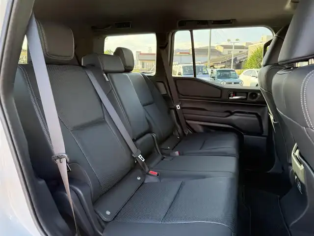 トヨタ ランドクルーザー ２５０ VX 香川県 2025(令7)年 0.5万km プラチナホワイトパールマイカ ワンオーナー/ディスプレイオーディオPLUS/JBLサウンド/サンルーフ/黒革シート/パワーシート/シートヒーター/シートベンチレーション/丸目LEDヘッドライト/デジタルインナーミラー/パワーバックドア/12.3インチTFTメーター/ルーフレール/置くだけ充電/クリアランスソナー/純正ヘッドライト積込/ビルトインETC2.0