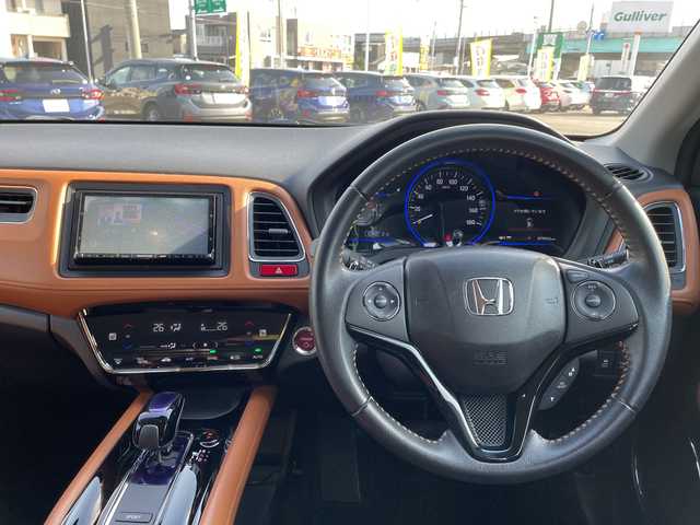 ホンダ ヴェゼル ハイブリッド Z 石川県 2014(平26)年 8万km ミスティックグリーンパール 社外メモリーナビ　フルセグＴＶ　バックカメラ　ＬＥＤヘッドライト　ハーフレザーシート　シートヒーター　スマートキー　ルーフレール　クルコン　レーダーブレーキ　純正アルミホイール