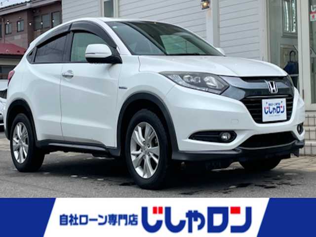 ホンダ ヴェゼル ハイブリッド X 秋田県 2014(平26)年 12.3万km ホワイトオーキッドパール (株)IDOMが運営する【じしゃロン 秋田店】の自社ローン専用車両になります。こちらは現金またはオートローンご利用時の価格です。自社ローンご希望の方は別途その旨お申付け下さい/４WD/スマートキー/純正ナビ/ワンセグテレビ/バックカメラ/クルーズコントロール/シートヒーター/ETC