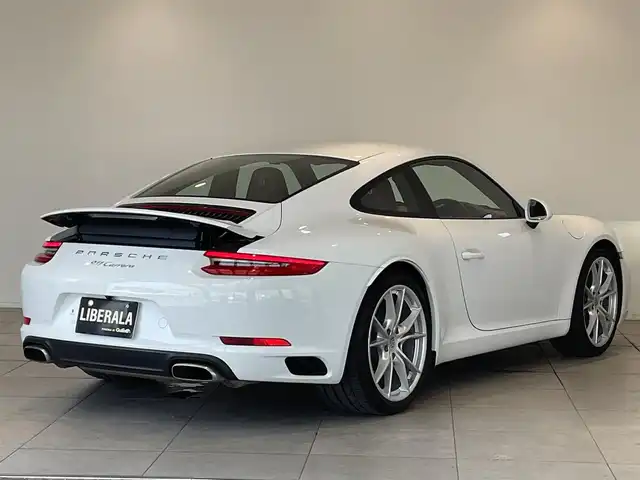 ポルシェ ９１１ カレラ 愛知県 2017(平29)年 4.8万km 白 レッドレザーインテリア（ボルドー）/シートヒーター　/純正ナビ　/Ｂｌｕｅｔｏｏｔｈ　/バックカメラ　/フルセグＴＶ　/ドライブレコーダー　/ＥＴＣ２．０　/オートエアコン　/電動格納ミラー/アイドリングストップ