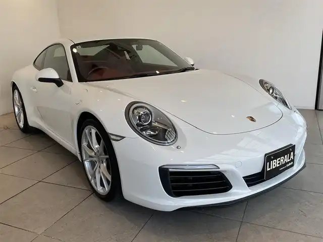ポルシェ ９１１ カレラ 愛知県 2017(平29)年 4.8万km 白 レッドレザーインテリア（ボルドー）/シートヒーター　/純正ナビ　/Ｂｌｕｅｔｏｏｔｈ　/バックカメラ　/フルセグＴＶ　/ドライブレコーダー　/ＥＴＣ２．０　/オートエアコン　/電動格納ミラー/アイドリングストップ
