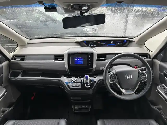 ホンダ フリード ハイブリット EX 富山県 2016(平28)年 4.3万km ホワイトオーキッドパール 純正ナビ（AM/FM/CD/DVD/USB/HDMI/BT）/フルセグTV/バックカメラ/寒冷地仕様/両側パワースライドドア/衝突被害軽減ブレーキ/アダプティブクルーズコントロール/レーンキープアシスト/LEDヘッドライト/オートライト/コーナーセンサー前後/ハーフレザーシート/前席シートヒーター/ビルトインETC/ドライブレコーダー前後/スマートキー/プッシュスタート/純正15インチAW