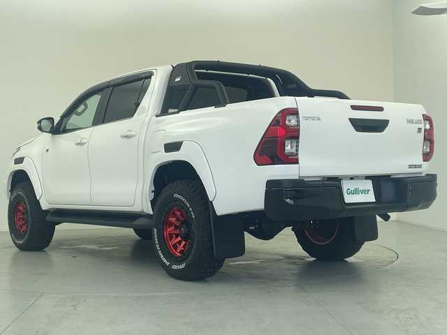 トヨタ ハイラックス Z GRスポーツ 愛知県 2023(令5)年 0.7万km スーパーホワイトⅡ 4WDディーゼルターボ/FUEL17インチAW/リフトアップ/ホワイトレターブロックタイヤ/純正ロールバー/純正ディスプレイオーディオ＆ナビ/Bluetooth/社外地デジTVチューナー/パノラミックビューモニター/プリクラッシュセーフティ/レーンディパーチャーアラート/レーダークルーズコントロール/ステアリングリモコン/パワーシート(D席)/純正フロアマット/LEDオートライト/LEDフォグランプ/スマートキー