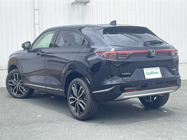 ホンダ ヴェゼル ハイブリッド e:HEV Z 三重県 2025(令7)年 0.1千km クリスタルブラックパール 登録済未使用車/純正ナビ/バックカメラ/BSM/ワイヤレス充電器/USB・タイプC給電ポート/デイライト/前後コーナーセンサー/前席シートヒーター/ステアリングヒーター/革巻きステアリング/パワーバックドア/パドルシフト/ビルトインETC2.0/スペアキー/電動格納ミラー/禁煙車