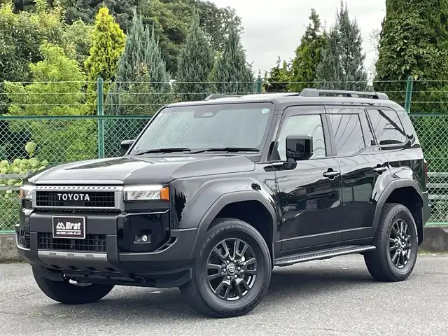 トヨタ ランドクルーザー ２５０ VX 千葉県 2024(令6)年 0.6万km ブラック ワンオーナー/ムーンルーフ/12.3インチディスプレイオーディオ（トヨタコネクティッドナビ対応）Plus/デジタルインナーミラー/パノラミックビューモニター/（フロント/サイド/バックカメラ）/トヨタセーフティセンス/本革シート表皮/（シートヒーター/ベンチレーター）/ETC2.0/BSM/パワーバックドア/レーダークルーズコントロール/ヘッドライトウォッシャー/純正ドアバイザー/純正フロアマット