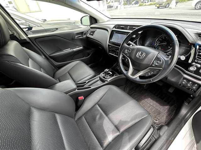 ホンダ グレイス ハイブリッド EX ホンダセンシング 福島県 2017(平29)年 4.7万km ホワイトオーキッドパール 純正ナビゲーション/型番：VXM-185VFi/【CD/DVD/SD/USB/BT/TV】/レザーシート/ホンダセンシング/衝突軽減ブレーキ〈CMBS〉/誤発進抑制機能/歩行者事故低減ステアリング/路外逸脱抑制機能/アダプティブクルーズコントロール〈ACC〉/車線維持支援システム〈LKAS〉/オートハイビーム/先行車発進お知らせ機能/標識認識機能/バックカメラ/ビルトインETC/ドライブレコーダー/パドルシフト/ステアリングリモコン/Moduloエアロ/LEDオートライト/LEDフォグランプ/純正フロアマット/ドアバイザー