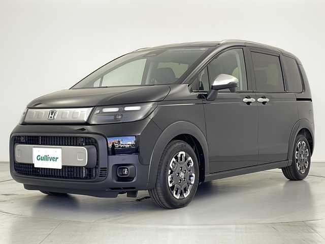 ホンダ フリード ハイブリット e:HEV クロスター 愛知県 2025(令7)年 0.1千km クリスタルブラックパール 登録済未使用車/ホンダセンシング/・衝突軽減ブレーキ/・誤発進抑制機能/・後方誤発進抑制機能/・近距離衝突軽減ブレーキ/・歩行者事故低減ステアリング/・路外逸脱抑制機能/・渋滞追従付アダプティブクルーズコントロール/・トラフィックアラート/・先行車発進のお知らせ/・オートハイビーム/・パーキングセンサー/純正ナビ/・AppleCarPlay/Android Auto/・Bluetooth/・フルセグTV/・FM/AM/バックカメラ/両側パワースライドドア/純正アルミホイール/ハーフレザーシート/シートヒーター/LEDヘッドライト/スマートキー/プッシュスタート/横滑り防止装置