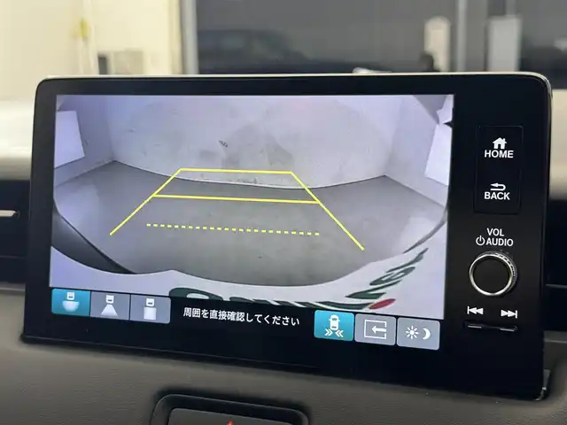 ホンダ ヴェゼル ハイブリッド e:HEV Z 滋賀県 2025(令7)年 0.1千km クリスタルブラックパール 純正9インチナビ/【Bluetooth/USB/Apple CarPlay/Android Auto】/バックカメラ/ハーフレザーシート/ホンダセンシング/・衝突軽減ブレーキ（CMBS）/・先行車発進お知らせ機能/・歩行者事故低減ステアリング/・路外逸脱抑制機能/・標識認識機能/・渋滞追従機能付アダプティブクルーズコントロール/・車線維持支援システム（LKAS）/・トラフィックジャムアシスト（渋滞運転支援機能）/・ブラインドスポットインフォメーション/・誤発進抑制機能/・後方誤発進抑制機能/・近距離衝突軽減ブレーキ/・急アクセル抑制機能/・パーキングセンサーシステム/・後退出庫サポート/・オートハイビーム/・アダプティブドライビングビーム/LEDヘッドライト/クリアランスソナー/シートヒーター/ステアリングヒーター/ヒルディセントコントロール/ワイヤレス充電/ビルトインETC2.0/衝突軽減ブレーキ/パワーバックドア/電動パーキングブレーキ/オートブレーキホールド/純正フロアマット