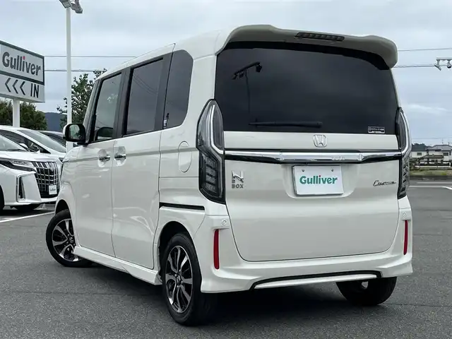 ホンダ Ｎ ＢＯＸ カスタム G L ホンダセンシング 奈良県 2018(平30)年 4.4万km プレミアムホワイトパールⅡ 純正7インチナビ（VXM-184VFi）/（フルセグ/BT/CD/DVD）/レーダークルーズコントロール/バックカメラ/後方コーナーセンサー/衝突軽減システム/レーンキープアシスト/片側パワースライドドア/後席サンシェード/LEDヘッドライト/オートライト/ETC/前方ドライブレコーダー/純正14インチAW/スペアキーX1