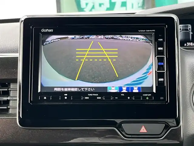 ホンダ Ｎ ＢＯＸ カスタム G L ホンダセンシング 奈良県 2018(平30)年 4.4万km プレミアムホワイトパールⅡ 純正7インチナビ（VXM-184VFi）/（フルセグ/BT/CD/DVD）/レーダークルーズコントロール/バックカメラ/後方コーナーセンサー/衝突軽減システム/レーンキープアシスト/片側パワースライドドア/後席サンシェード/LEDヘッドライト/オートライト/ETC/前方ドライブレコーダー/純正14インチAW/スペアキーX1