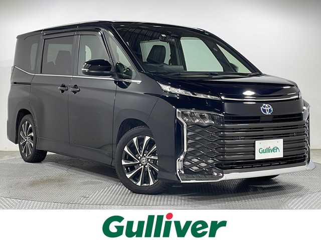 トヨタ ヴォクシー ハイブリッド S－Z 広島県 2022(令4)年 3.8万km アティチュードブラックマイカ 純正10.5型ナビ　/フリップダウンモニター　/バックカメラ　/レーダークルーズコントロール　/フルセグ　/シートヒータ　/両側パワースライドドア　/レーンキープアシスト　/オートハイビーム  /コーナーセンサー /純正17インチアルミホイール(205/55/R17)/エアバック（運転席/助手席/サイド）