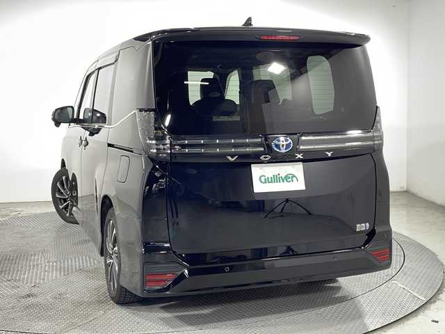 トヨタ ヴォクシー ハイブリッド S－Z 広島県 2022(令4)年 3.8万km アティチュードブラックマイカ 純正10.5型ナビ　/フリップダウンモニター　/バックカメラ　/レーダークルーズコントロール　/フルセグ　/シートヒータ　/両側パワースライドドア　/レーンキープアシスト　/オートハイビーム  /コーナーセンサー /純正17インチアルミホイール(205/55/R17)/エアバック（運転席/助手席/サイド）