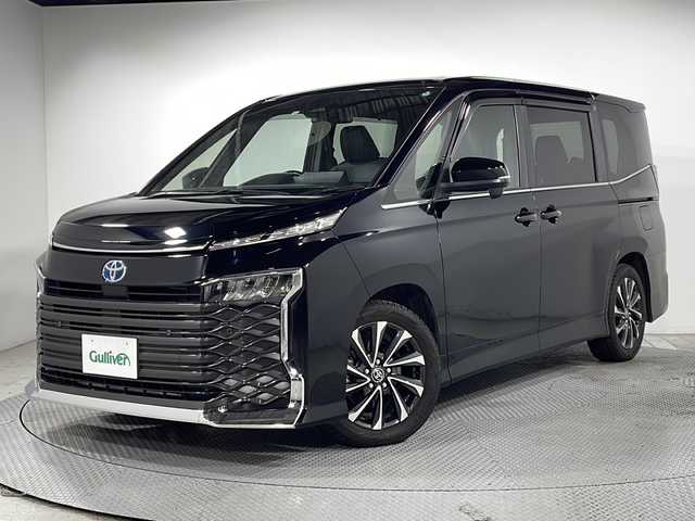 トヨタ ヴォクシー ハイブリッド S－Z 広島県 2022(令4)年 3.8万km アティチュードブラックマイカ 純正10.5型ナビ　/フリップダウンモニター　/バックカメラ　/レーダークルーズコントロール　/フルセグ　/シートヒータ　/両側パワースライドドア　/レーンキープアシスト　/オートハイビーム  /コーナーセンサー /純正17インチアルミホイール(205/55/R17)/エアバック（運転席/助手席/サイド）