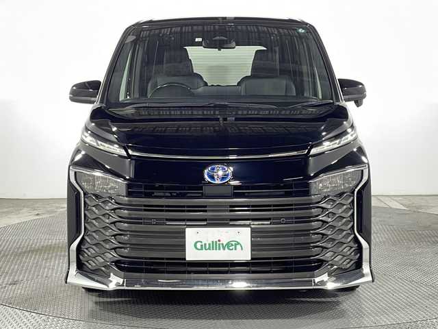 トヨタ ヴォクシー ハイブリッド S－Z 広島県 2022(令4)年 3.8万km アティチュードブラックマイカ 純正10.5型ナビ　/フリップダウンモニター　/バックカメラ　/レーダークルーズコントロール　/フルセグ　/シートヒータ　/両側パワースライドドア　/レーンキープアシスト　/オートハイビーム  /コーナーセンサー /純正17インチアルミホイール(205/55/R17)/エアバック（運転席/助手席/サイド）