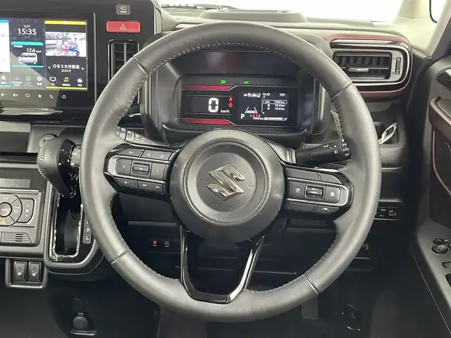 スズキ スペーシア カスタム HYBRID XS 大分県 2024(令6)年 0.7万km ブルーイッシュブラックパール3 純正メモリナビ/スズキセーフティーサポート/ヘッドアップディスプレイ/ステアリングヒーター/両側パワースライドドア/シートヒーター（前席）/USB入力端子/コーナーセンサー/純正アルミホイル15インチ/革巻ステアリング/革巻シフトノブ/プッシュスタート/スマートキー