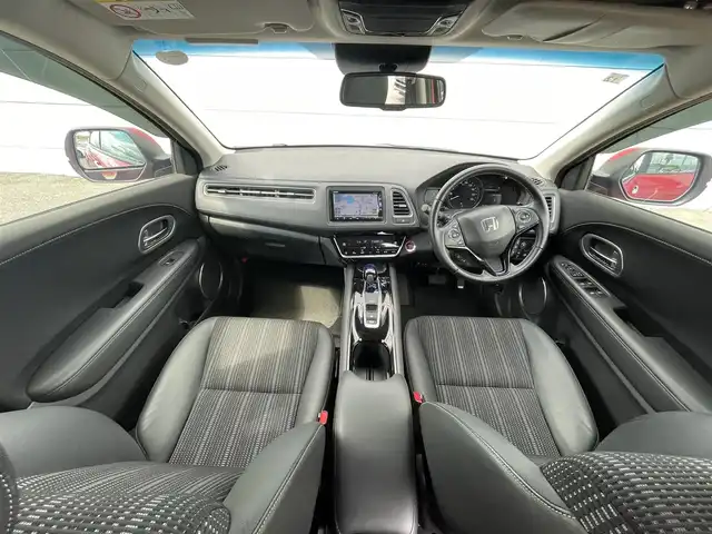 ホンダ ヴェゼル ハイブリッド Z ホンダセンシング 千葉県 2016(平28)年 2.5万km プレミアムクリスタルレッドM 純正ナビ/   フルセグTV/CD/DVD/Bluetooth/USB/バックモニター/衝突軽減ブレーキ/横滑り防止装置/前席シートヒーター/レーダークルーズコントロール/レーンキープアシスト/アイドリングストップ/ステアリングスイッチ/純正17インチアルミホイール/純正フロアマット/プッシュスタート/スマートキー/ハーフレザー/ＥＴＣ/ＬＥＤ/禁煙車