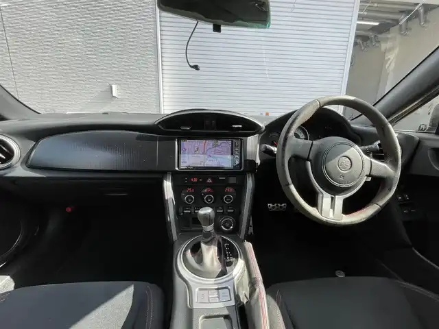 トヨタ ８６ GT 福島県 2013(平25)年 12.7万km クリスタルブラックシリカ (株)IDOMが運営する【じしゃロン福島店】の自社ローン専用車両になります。こちらは現金またはオートローンご利用時の価格です。自社ローンご希望の方は別途その旨お申付け下さい/・社外ナビ（AM/FM/CD/DVD/SD/BT)/・フルセグテレビ/・バックカメラ/・ETC/・パドルシフト/・プッシュスタート/・フォグランプ/・バイザー/・純正マット