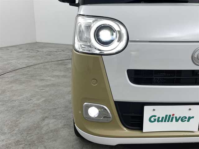 ダイハツ ムーヴ キャンバス ストライプス G 福島県 2022(令4)年 0.5万km シャイニングホワイトパール/サンドベージュメタリック スマートアシスト　/・車線逸脱警報/・衝突軽減システム/・オートハイビーム/・コーナーセンサー/純正ナビゲーション/【AM/FM/DVD/CD/Bluetooth/フルセグ】/型番:NMZN-W72D/全方位カメラ　/ドラレコ　/ＥＴＣ2.0　/両側パワースライドドア　/シートヒーター　/電子パーキング　/・ブレーキホールド　/プッシュスタート　/・スマートキー　/・スペアキー　/LEDライト　/・オートライト