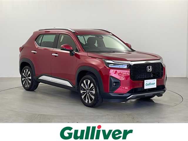 ホンダ ＷＲ－Ｖ Z+ 栃木県 2024(令6)年 0.1万km 赤 禁煙車/Gathersナビ/　フルセグTV/BT/USB/ホンダセンシング/・衝突軽減ブレーキ（CMBS）/・先行車発進お知らせ機能/・歩行者事故低減ステアリング/・路外逸脱抑制機能/・標識認識機能/・車線維持支援システム（LKAS）/・誤発進抑制機能/・アダプティブクルーズコントロール（ACC）/・オートハイビーム/LEDヘッドライト/前後コーナーセンサー/バックカメラ/ビルトインETC/純正フロアマット
