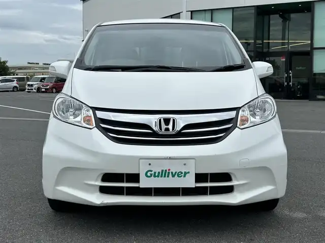 ホンダ フリード G ジャストセレクション 奈良県 2013(平25)年 1.7万km ホワイトオーキッドパール 社外ナビ　/フルセグ　/ＤＶＤ　/ＵＳＢ入力端子　/Ｂｌｕｅｔｏｏｔｈ　/バックカメラ　/ＥＴＣ　/片側パワースライドドア　/純正ラバーフロアマット　/オートライト　/横滑り防止装置　/ワンオーナー　/スペアキー１本　/保証書