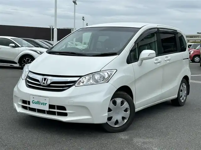 ホンダ フリード G ジャストセレクション 奈良県 2013(平25)年 1.7万km ホワイトオーキッドパール 社外ナビ　/フルセグ　/ＤＶＤ　/ＵＳＢ入力端子　/Ｂｌｕｅｔｏｏｔｈ　/バックカメラ　/ＥＴＣ　/片側パワースライドドア　/純正ラバーフロアマット　/オートライト　/横滑り防止装置　/ワンオーナー　/スペアキー１本　/保証書