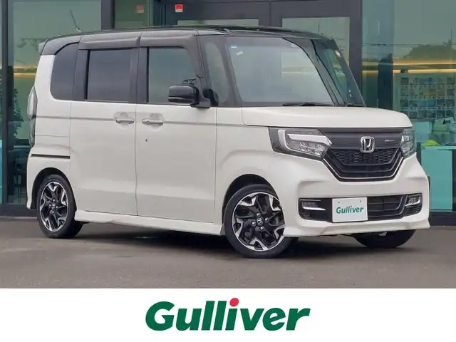 ホンダ Ｎ ＢＯＸ カスタム G EX ターボ ホンダセンシング 東京都 2018(平30)年 7.6万km プレミアムホワイトパールⅡ 無限フロントグリル/アルパイン製11型フローティングナビ/　・フルセグＴＶ/　・Bluetooth接続/バックカメラ/アルパイン製リヤヘッドレストモニター×２/ドライブレコーダー/ビルトインETC/Honda SENSING/・衝突軽減ブレーキ/・誤発進抑制機能/・路外逸脱抑制機能/・アダプティブクルーズコントロール/プッシュスタート/パドルシフト/両側パワースライドドア/レザー調シートカバー Clazzio/後席ロールサンシェード/LEDヘッドライト/オートライト/純正フロアマット/純正15インチアルミホイール/スマートキー