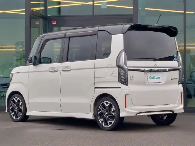 ホンダ Ｎ ＢＯＸ カスタム G EX ターボ ホンダセンシング 東京都 2018(平30)年 7.6万km プレミアムホワイトパールⅡ 無限フロントグリル/アルパイン製11型フローティングナビ/　・フルセグＴＶ/　・Bluetooth接続/バックカメラ/アルパイン製リヤヘッドレストモニター×２/ドライブレコーダー/ビルトインETC/Honda SENSING/・衝突軽減ブレーキ/・誤発進抑制機能/・路外逸脱抑制機能/・アダプティブクルーズコントロール/プッシュスタート/パドルシフト/両側パワースライドドア/レザー調シートカバー Clazzio/後席ロールサンシェード/LEDヘッドライト/オートライト/純正フロアマット/純正15インチアルミホイール/スマートキー