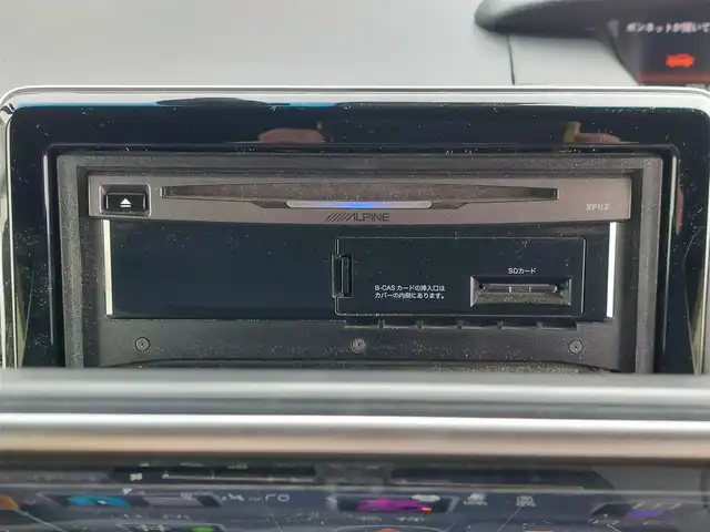 ホンダ Ｎ ＢＯＸ カスタム G EX ターボ ホンダセンシング 東京都 2018(平30)年 7.6万km プレミアムホワイトパールⅡ 無限フロントグリル/アルパイン製11型フローティングナビ/　・フルセグＴＶ/　・Bluetooth接続/バックカメラ/アルパイン製リヤヘッドレストモニター×２/ドライブレコーダー/ビルトインETC/Honda SENSING/・衝突軽減ブレーキ/・誤発進抑制機能/・路外逸脱抑制機能/・アダプティブクルーズコントロール/プッシュスタート/パドルシフト/両側パワースライドドア/レザー調シートカバー Clazzio/後席ロールサンシェード/LEDヘッドライト/オートライト/純正フロアマット/純正15インチアルミホイール/スマートキー