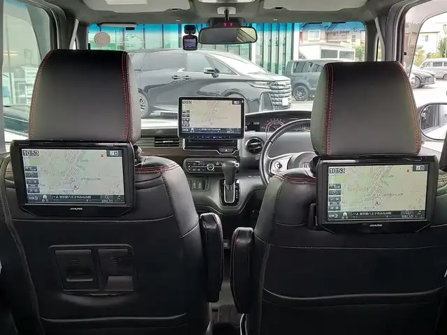 ホンダ Ｎ ＢＯＸ カスタム G EX ターボ ホンダセンシング 東京都 2018(平30)年 7.6万km プレミアムホワイトパールⅡ 無限フロントグリル/アルパイン製11型フローティングナビ/　・フルセグＴＶ/　・Bluetooth接続/バックカメラ/アルパイン製リヤヘッドレストモニター×２/ドライブレコーダー/ビルトインETC/Honda SENSING/・衝突軽減ブレーキ/・誤発進抑制機能/・路外逸脱抑制機能/・アダプティブクルーズコントロール/プッシュスタート/パドルシフト/両側パワースライドドア/レザー調シートカバー Clazzio/後席ロールサンシェード/LEDヘッドライト/オートライト/純正フロアマット/純正15インチアルミホイール/スマートキー