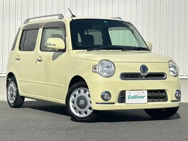 ダイハツ ミラ ココア プラスX 群馬県 2014(平26)年 5.9万km コットンアイボリー 社外ナビ(FM/AM/CD/SD)/TV/ETC/リモコンキー/純正ドアバイザー/フロアマット/純正ホイールキャップ/ウインカーミラー/アイドリングストップ/保証書/取扱説明書