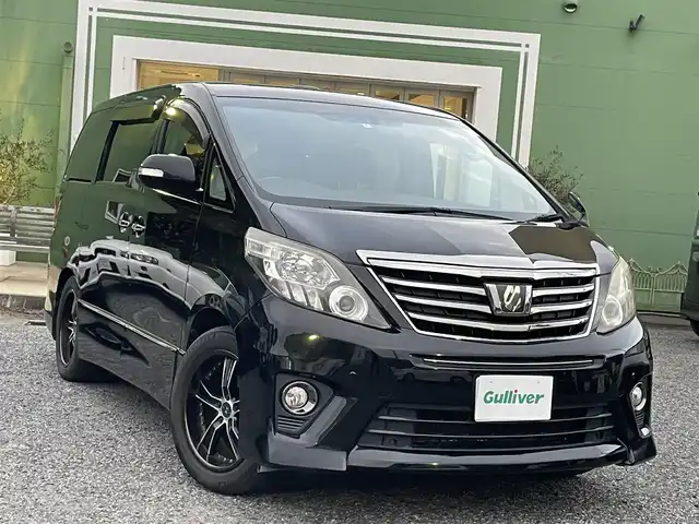トヨタ アルファード 240S タイプゴールドⅡ 埼玉県 2014(平26)年 6.1万km ブラック ワンオーナー/ツインムーンルーフ/純正ナビTV/純正フリップダウンモニター/バックカメラ/ビルトインETC/前方ドライブレコーダー/ハーフレザーシート/両側パワースライドドア/パワーバックドア/クルーズコントロール/クリアランスソナー/社外18インチアルミ/純正AW＋スタッドレス車載/プッシュスタート/スマートキー/保証書付整備手帳/取扱説明書